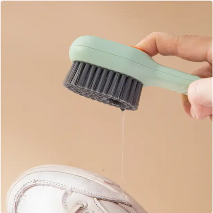 Shoes cleaning brush with fluid dispenser